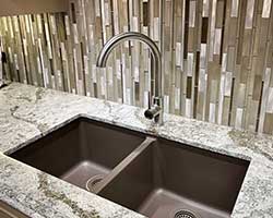 Faucets, Sinks & Wallpaper available at Traditional Floors & Design